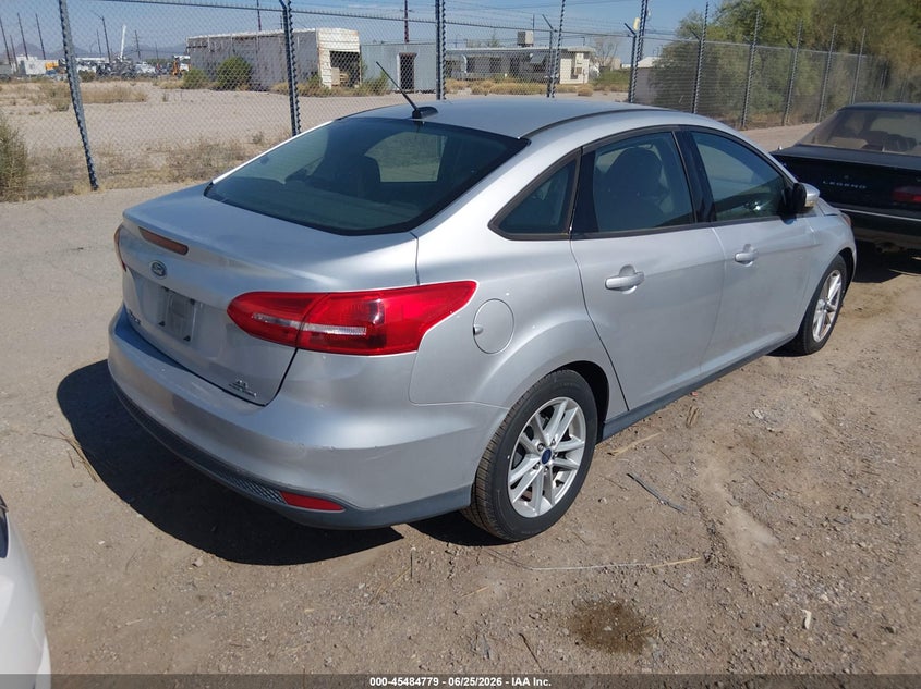 2015 Ford Focus VIN 1FADP3F25FL316563 IAAI salvage auction — NORMAL WEAR, Clear-Dealer Only (Arizona), sold $75 on 2026-07-09 (photo 4)