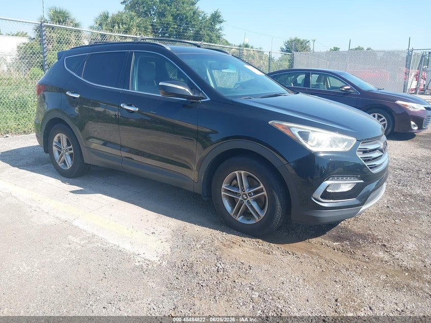 2018 Hyundai Santa fe VIN 5XYZU3LB6JG563110 IAAI salvage auction — NORMAL WEAR, Clear (Florida), sold $4,650 on 2026-07-08 (photo 1)