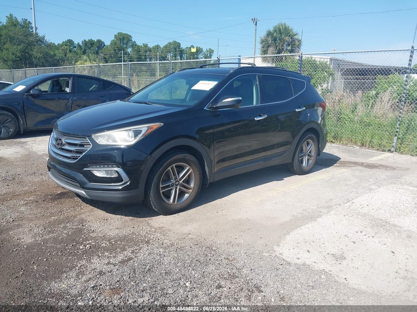 2018 Hyundai Santa fe VIN 5XYZU3LB6JG563110 IAAI salvage auction — NORMAL WEAR, Clear (Florida), sold $4,650 on 2026-07-08 (photo 2)