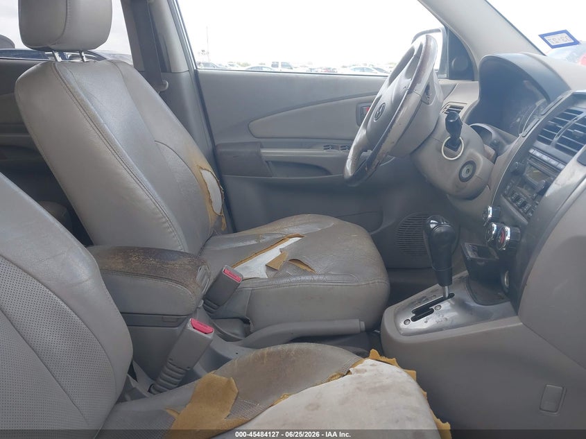 2005 Hyundai Tucson VIN KM8JN12D65U196999 IAAI salvage auction — NORMAL WEAR, Original (Texas), sold $375 on 2026-07-29 (photo 5)