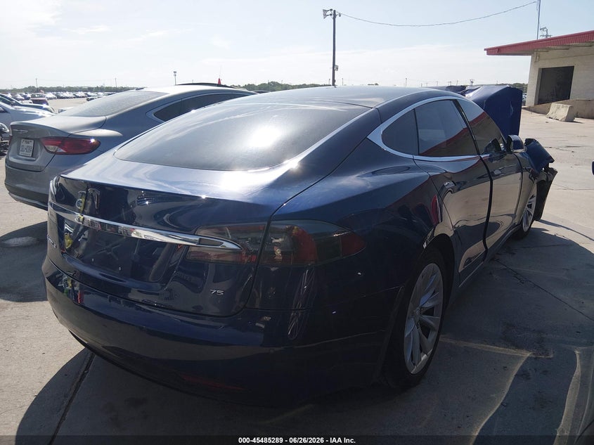 2017 Tesla Model s VIN 5YJSA1E18HF228421 IAAI salvage auction — NORMAL WEAR, Original (Texas), sold $2,200 on 2026-07-27 (photo 4)