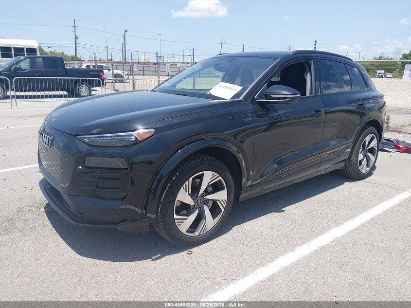 2025 Audi Q6 VIN WA124BGF1SA044731 IAAI salvage auction — SIDE, Salvage Title, sold $25,000 on 2026-08-21 (photo 2)