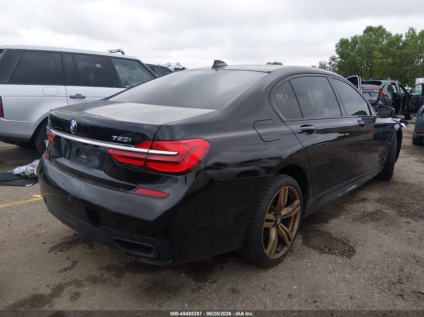 2017 BMW 7er VIN WBA7F0C32HGM21544 IAAI salvage auction — TRANSMISSION, Clear (Colorado), sold $2,825 on 2026-07-28 (photo 4)