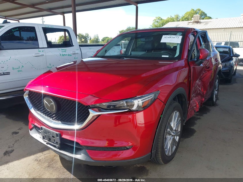 2021 Mazda Cx-5 VIN JM3KFBDM3M1384881 IAAI salvage auction — SIDE, Salvage (California), sold $7,450 on 2026-07-28 (photo 2)