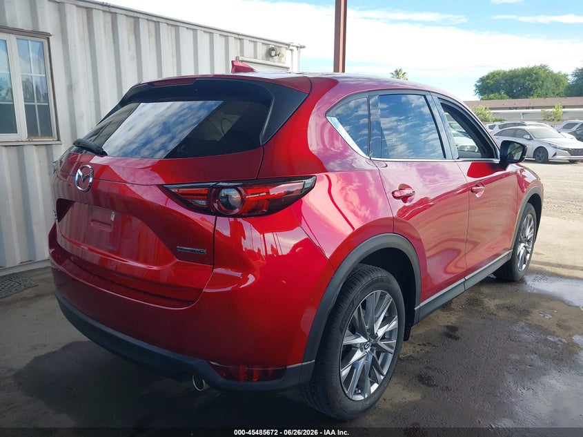 2021 Mazda Cx-5 VIN JM3KFBDM3M1384881 IAAI salvage auction — SIDE, Salvage (California), sold $7,450 on 2026-07-28 (photo 4)