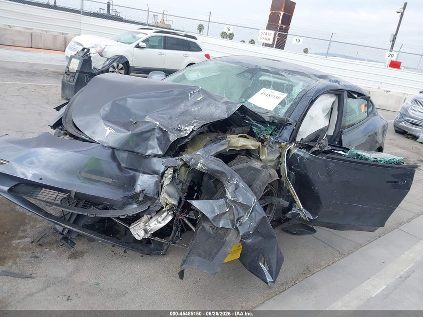 2021 Tesla Model 3 VIN 5YJ3E1EB9MF051020 IAAI salvage auction — ALL OVER, Wait Title, sold $1,300 on 2026-10-04 (photo 6)