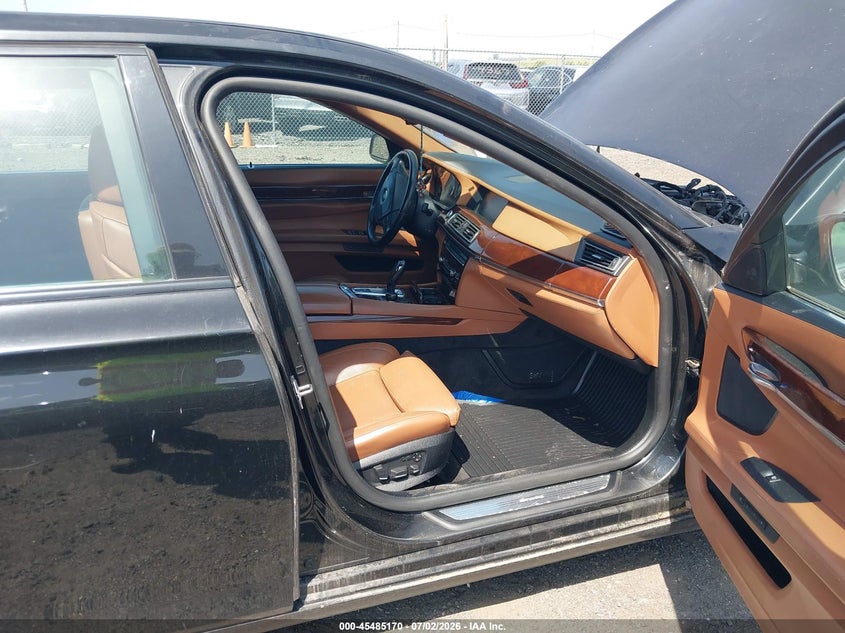 2011 BMW 7 series VIN WBAKC8C52BC433307 IAAI salvage auction — FRONT END, Clear (Florida), sold $650 on 2026-07-29 (photo 5)