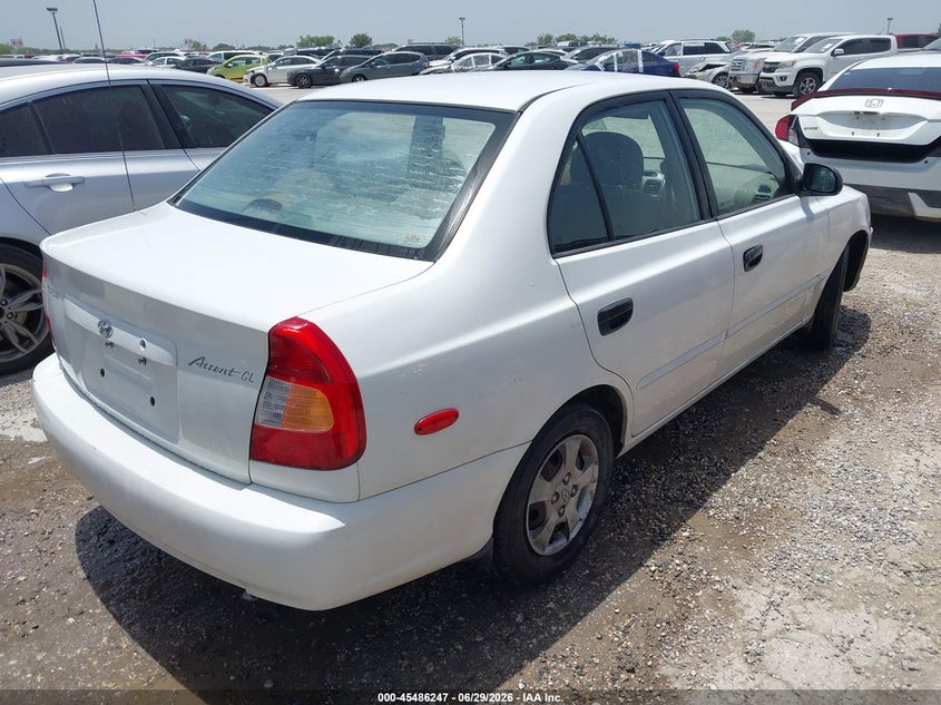2000 Hyundai Accent VIN KMHCG45G4YU081011 IAAI salvage auction — NORMAL WEAR, Original (Texas), sold $225 on 2026-07-20 (photo 4)