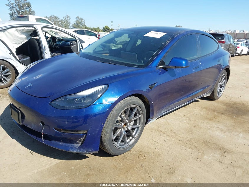2022 Tesla Model 3 VIN 5YJ3E1EAXNF374145 IAAI salvage auction — SIDE, Salvage (California), sold $8,725 on 2026-07-22 (photo 2)
