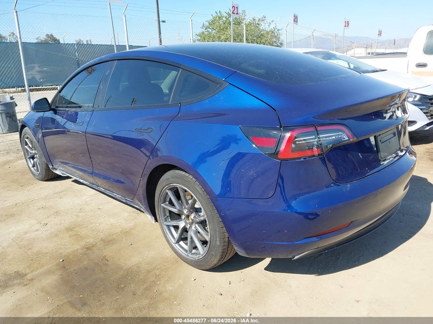 2022 Tesla Model 3 VIN 5YJ3E1EAXNF374145 IAAI salvage auction — SIDE, Salvage (California), sold $8,725 on 2026-07-22 (photo 3)