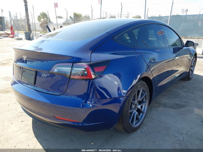 2022 Tesla Model 3 VIN 5YJ3E1EAXNF374145 IAAI salvage auction — SIDE, Salvage (California), sold $8,725 on 2026-07-22 (photo 4)
