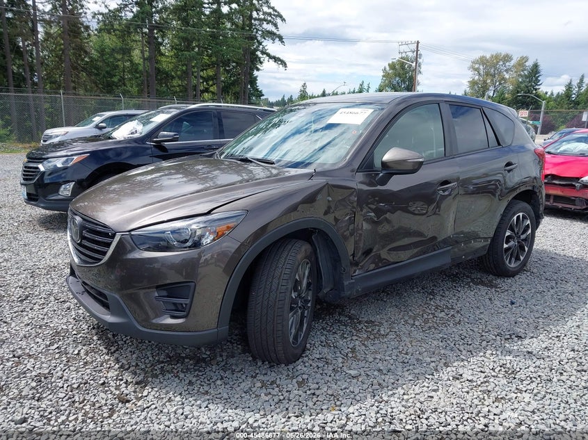 2016 Mazda Cx-5 VIN JM3KE4DY3G0674548 IAAI salvage auction — LEFT SIDE, Salvage Title, sold $3,850 on 2026-07-29 (photo 2)