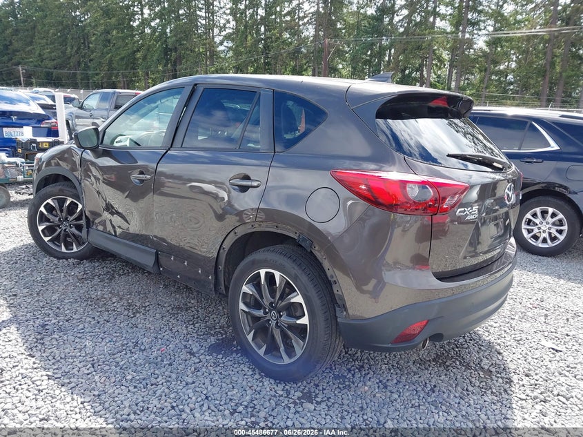 2016 Mazda Cx-5 VIN JM3KE4DY3G0674548 IAAI salvage auction — LEFT SIDE, Salvage Title, sold $3,850 on 2026-07-29 (photo 3)