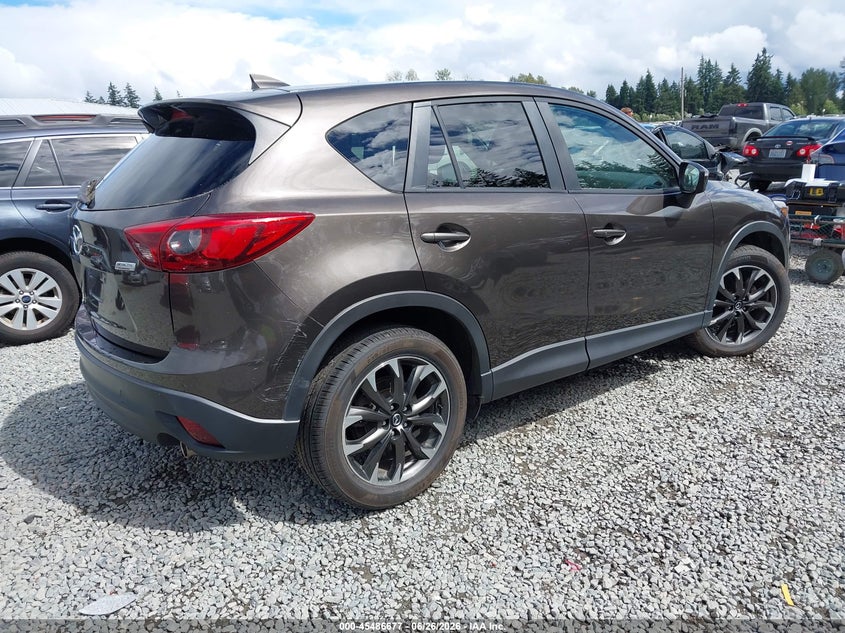 2016 Mazda Cx-5 VIN JM3KE4DY3G0674548 IAAI salvage auction — LEFT SIDE, Salvage Title, sold $3,850 on 2026-07-29 (photo 4)