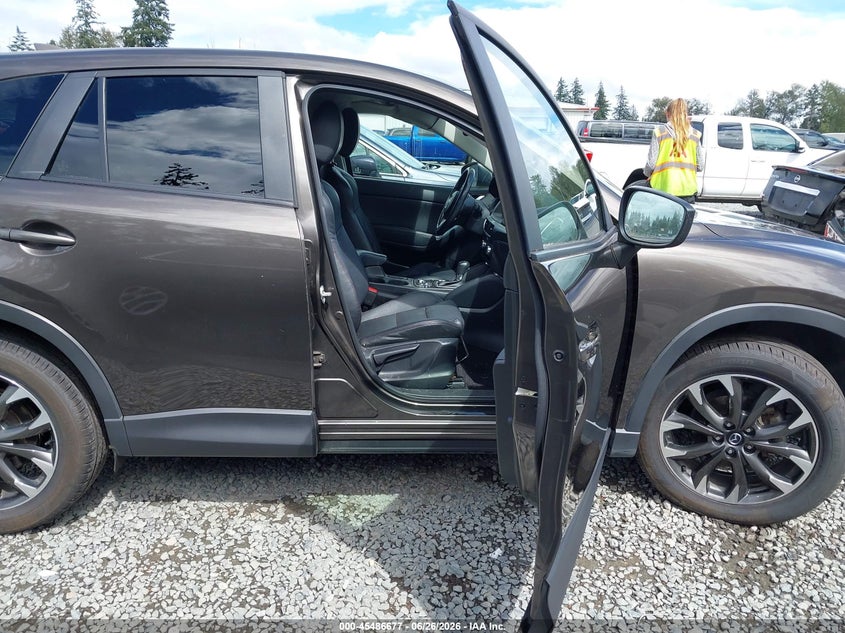 2016 Mazda Cx-5 VIN JM3KE4DY3G0674548 IAAI salvage auction — LEFT SIDE, Salvage Title, sold $3,850 on 2026-07-29 (photo 5)