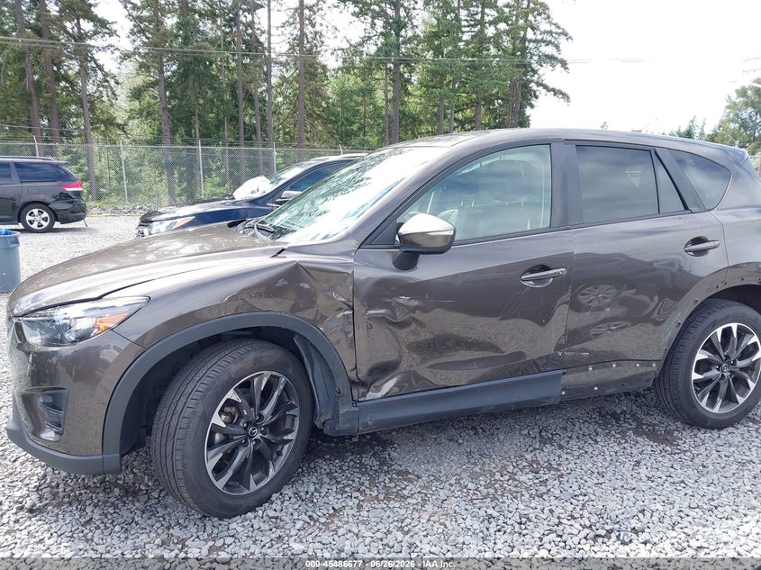2016 Mazda Cx-5 VIN JM3KE4DY3G0674548 IAAI salvage auction — LEFT SIDE, Salvage Title, sold $3,850 on 2026-07-29 (photo 6)