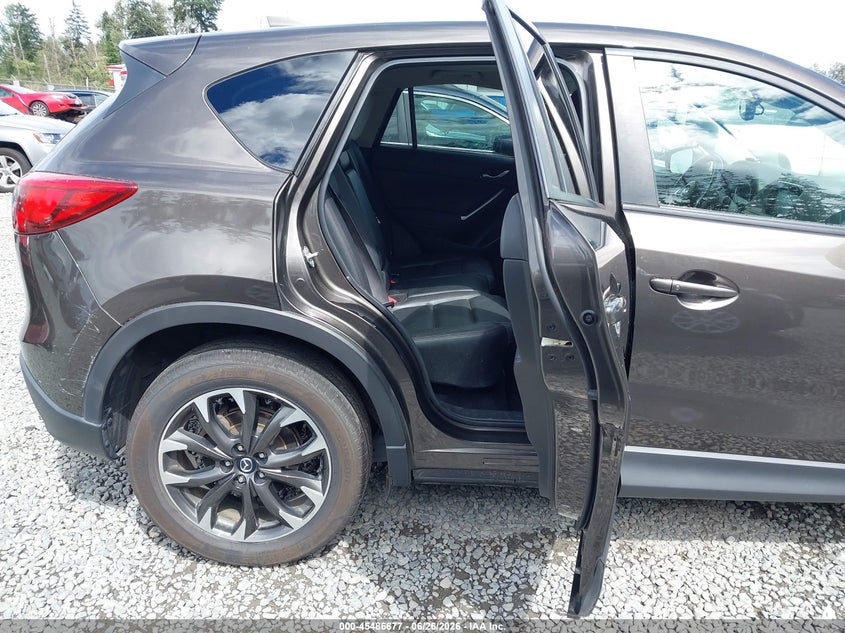 2016 Mazda Cx-5 VIN JM3KE4DY3G0674548 IAAI salvage auction — LEFT SIDE, Salvage Title, sold $3,850 on 2026-07-29 (photo 8)