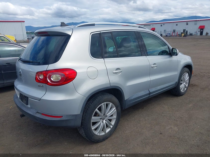 2010 Volkswagen Tiguan VIN WVGAV7AX6AW511491 IAAI salvage auction — NORMAL WEAR, Clear (Washington), sold $25 on 2026-07-21 (photo 4)