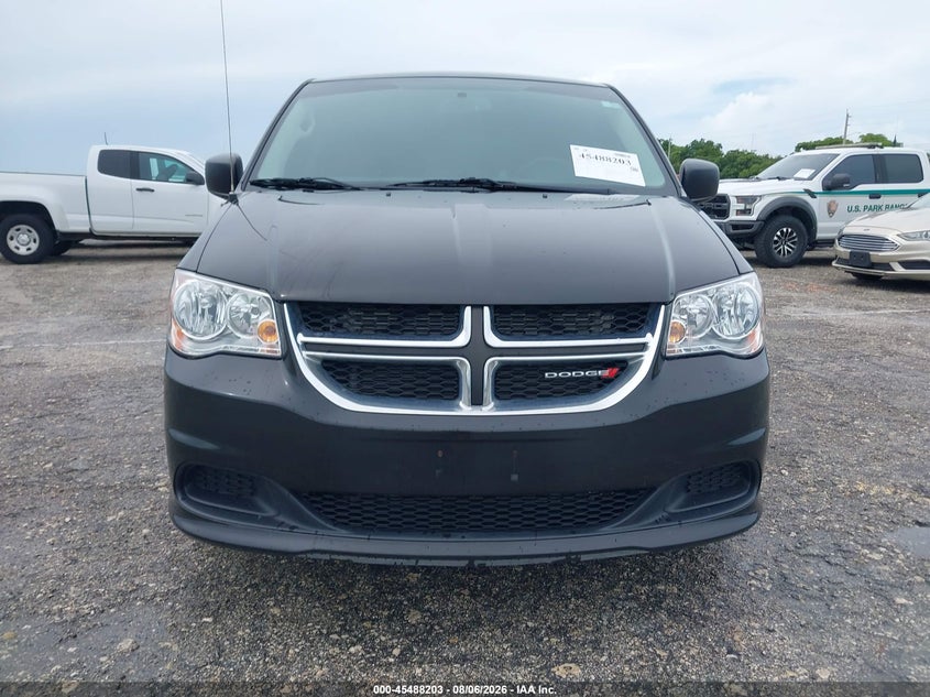 2017 Dodge Caravan VIN 2C4RDGBG1HR836268 IAAI salvage auction — NORMAL WEAR, Sf97 (Florida), sold $1,050 on 2026-09-09 (photo 6)
