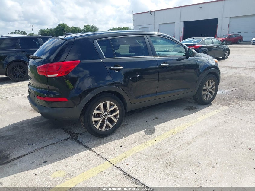 2014 Kia Sportage VIN KNDPBCAC2E7585083 IAAI salvage auction — LEFT SIDE, Rebuildable (Florida), sold $1,100 on 2026-07-22 (photo 4)