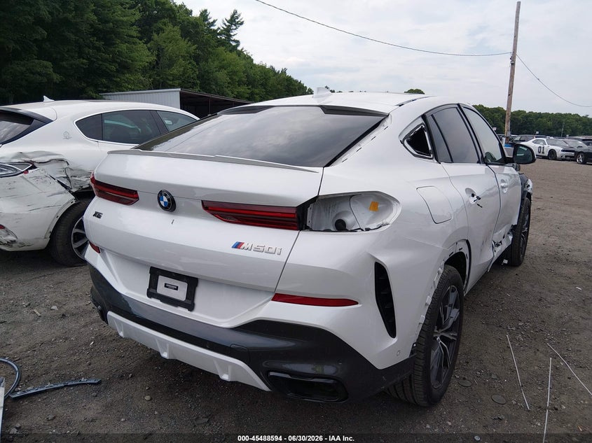 2021 BMW X6 VIN 5UXCY8C02M9F92021 IAAI salvage auction — Side, Salvage (Massachusetts), sold $27,500 on 2026-09-04 (photo 4)