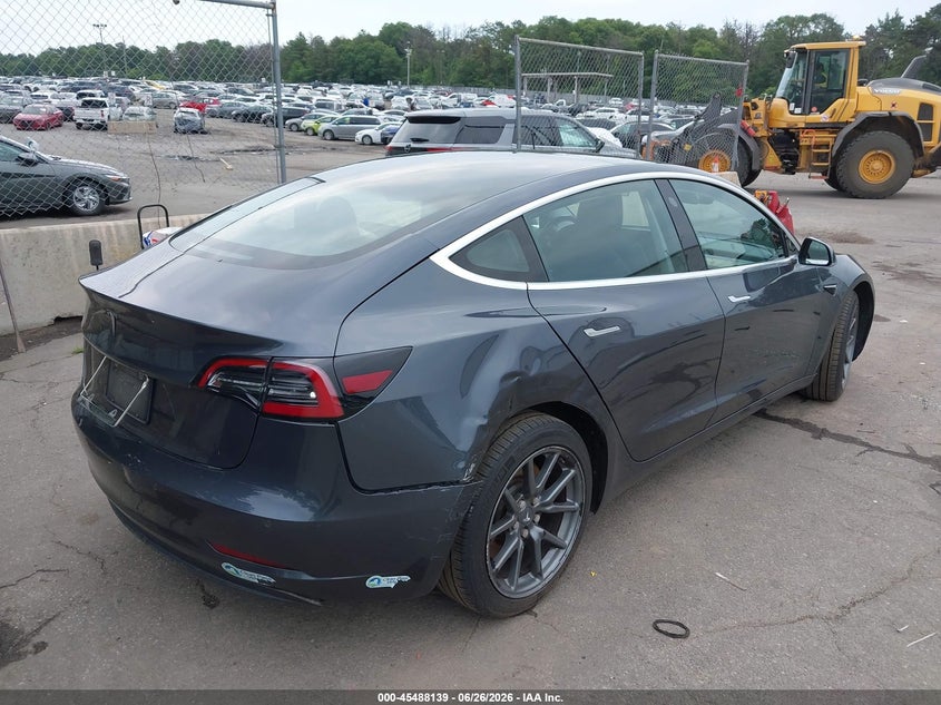 2018 Tesla Model 3 VIN 5YJ3E1EA8JF040951 IAAI salvage auction — REAR END, Mv-907A (New York), sold $4,800 on 2026-07-17 (photo 4)