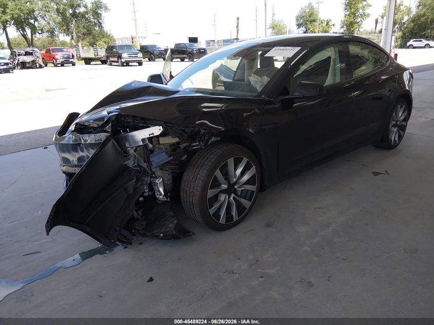 2024 Tesla Model 3 VIN 5YJ3E1EB2RF732322 IAAI salvage auction — FRONT END, Rebuildable (Florida), sold $10,900 on 2026-07-16 (photo 2)
