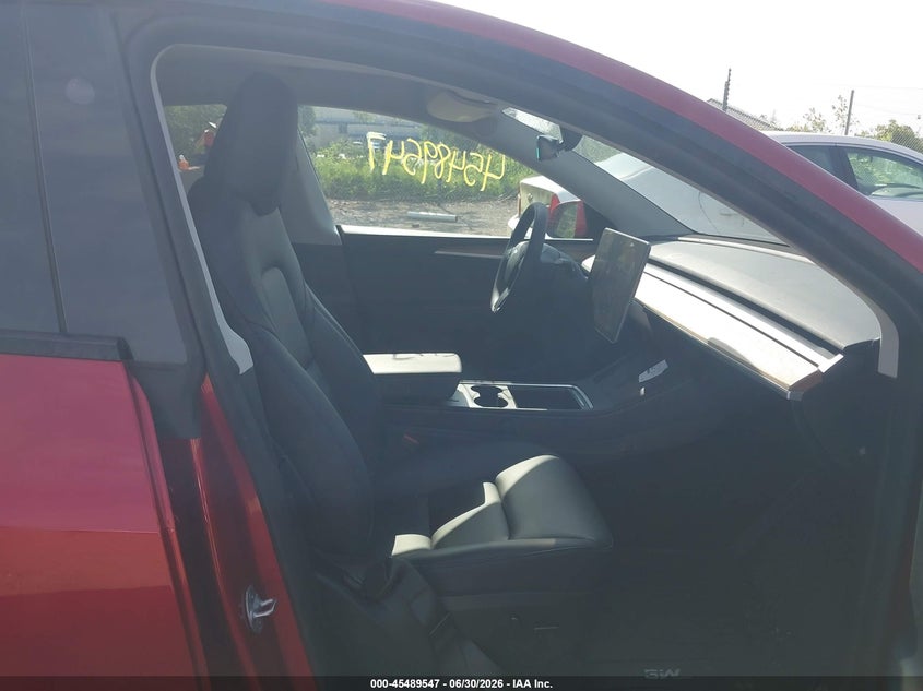 2024 Tesla Model y VIN 7SAYGDEE8RA275057 IAAI salvage auction — FRONT END, Clear Claim Paid (Wisconsin), sold $8,000 on 2026-07-29 (photo 5)