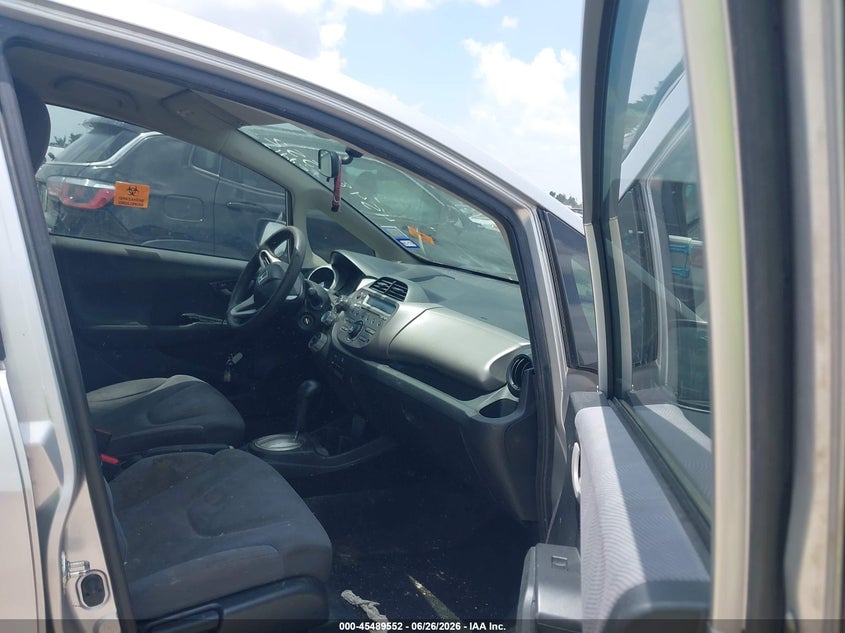 2012 Honda Fit VIN JHMGE8H33CC003957 IAAI salvage auction — NORMAL WEAR, Original (Texas), sold $475 on 2026-07-29 (photo 5)