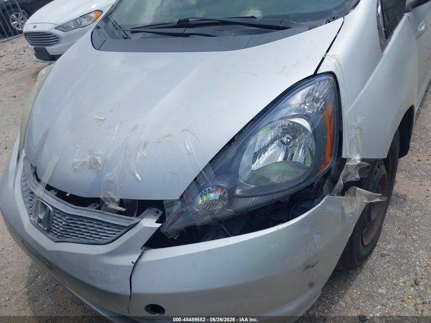 2012 Honda Fit VIN JHMGE8H33CC003957 IAAI salvage auction — NORMAL WEAR, Original (Texas), sold $475 on 2026-07-29 (photo 6)