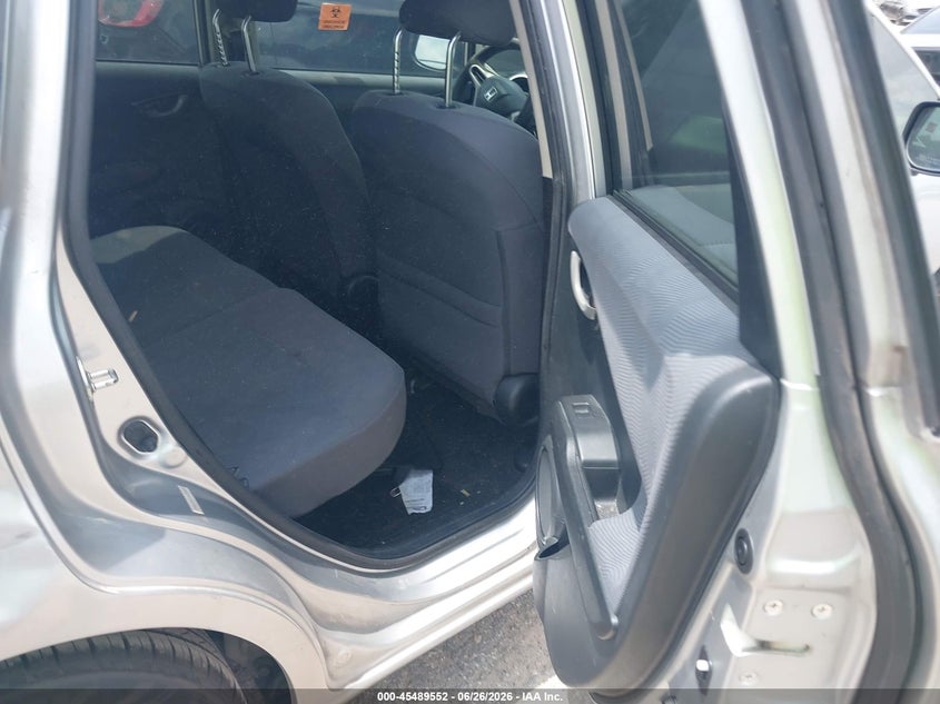 2012 Honda Fit VIN JHMGE8H33CC003957 IAAI salvage auction — NORMAL WEAR, Original (Texas), sold $475 on 2026-07-29 (photo 8)