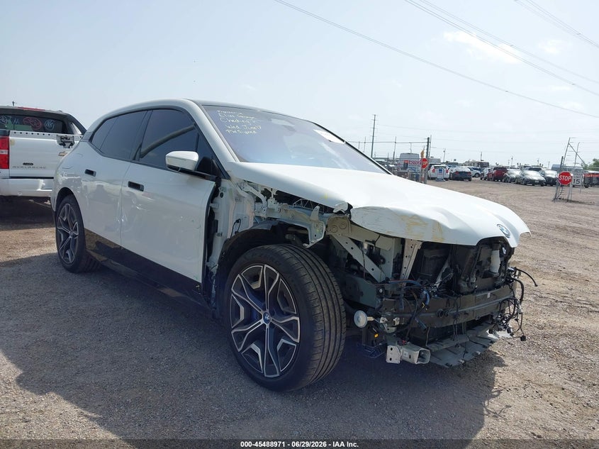 2023 BMW Ix VIN WB523CF0XPCM24038 IAAI salvage auction — FRONT END, Original (Texas), sold $23,300 on 2026-08-02 (photo 1)