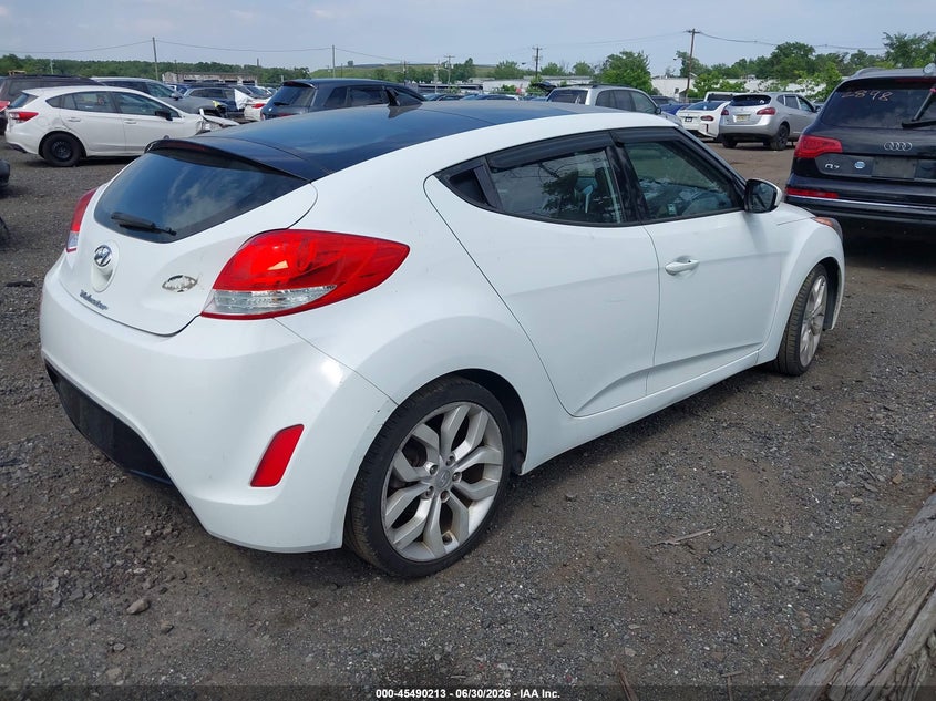 2013 Hyundai Veloster VIN KMHTC6AD2DU141333 IAAI salvage auction — NORMAL WEAR, Clear (New Jersey), sold $400 on 2026-07-13 (photo 4)