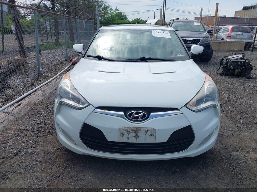 2013 Hyundai Veloster VIN KMHTC6AD2DU141333 IAAI salvage auction — NORMAL WEAR, Clear (New Jersey), sold $400 on 2026-07-13 (photo 6)