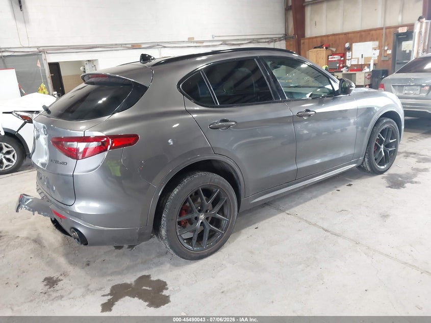 2020 Alfa romeo Stelvio VIN ZASPAKBN0L7C73734 IAAI salvage auction — REAR END, Salvage Title, sold $10,600 on 2026-08-09 (photo 4)