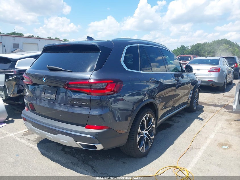 2020 BMW X5 VIN 5UXCR4C00L9D05831 IAAI salvage auction — SIDE, Salvage (North Carolina), sold $18,350 on 2026-07-29 (photo 4)