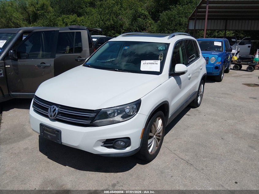 2015 Volkswagen Tiguan VIN WVGAV7AX3FW505042 IAAI salvage auction — NORMAL WEAR, Original (Texas), sold $1,400 on 2026-07-29 (photo 2)