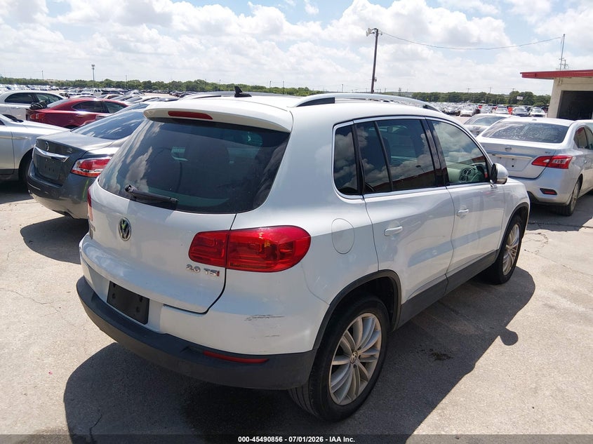 2015 Volkswagen Tiguan VIN WVGAV7AX3FW505042 IAAI salvage auction — NORMAL WEAR, Original (Texas), sold $1,400 on 2026-07-29 (photo 4)