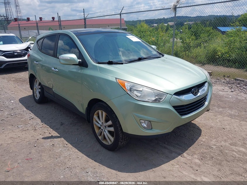 2010 Hyundai Tucson VIN KM8JUCAC8AU105474 IAAI salvage auction — SIDE, Salvage (Pennsylvania), sold $1,750 on 2026-07-08 (photo 1)