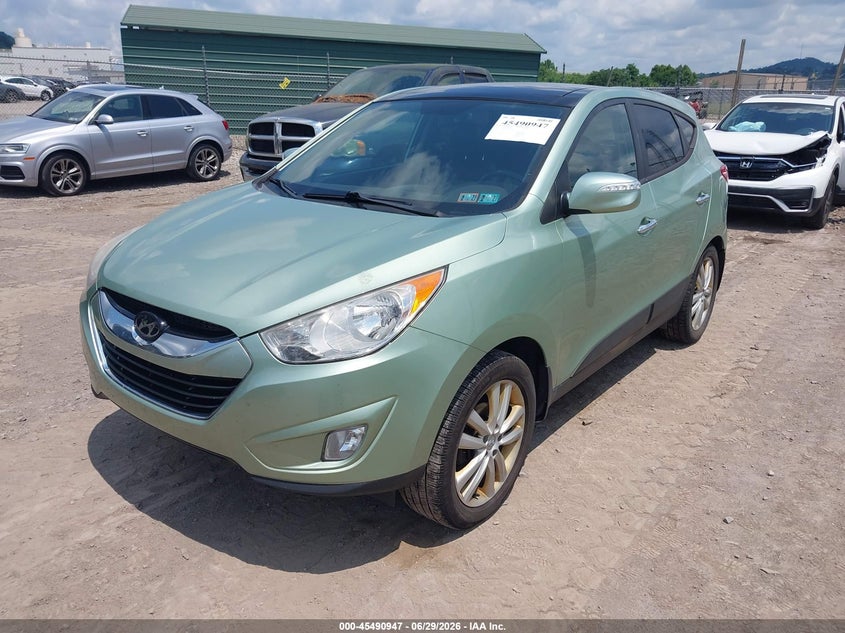 2010 Hyundai Tucson VIN KM8JUCAC8AU105474 IAAI salvage auction — SIDE, Salvage (Pennsylvania), sold $1,750 on 2026-07-08 (photo 2)