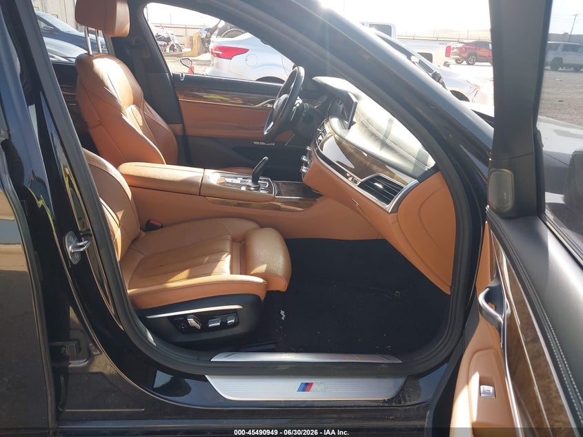2016 BMW 7er VIN WBA7E2C51GG504462 IAAI salvage auction — FRESH WATER, Salvage Title, sold $8,600 on 2026-08-13 (photo 5)