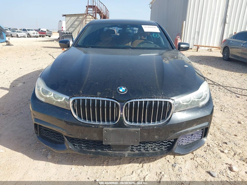 2016 BMW 7er VIN WBA7E2C51GG504462 IAAI salvage auction — FRESH WATER, Salvage Title, sold $8,600 on 2026-08-13 (photo 6)