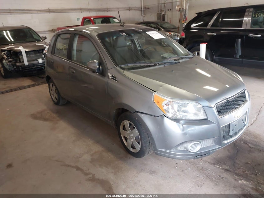 2011 Chevrolet Aveo VIN KL1TD6DE3BB182785 IAAI salvage auction — NORMAL WEAR, Clear (Minnesota), sold $350 on 2026-07-15 (photo 1)