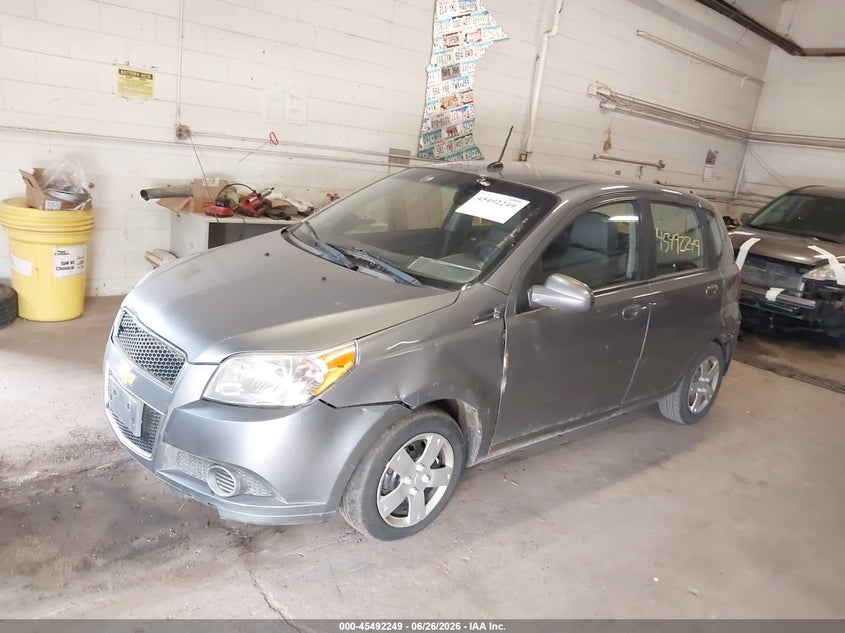 2011 Chevrolet Aveo VIN KL1TD6DE3BB182785 IAAI salvage auction — NORMAL WEAR, Clear (Minnesota), sold $350 on 2026-07-15 (photo 2)