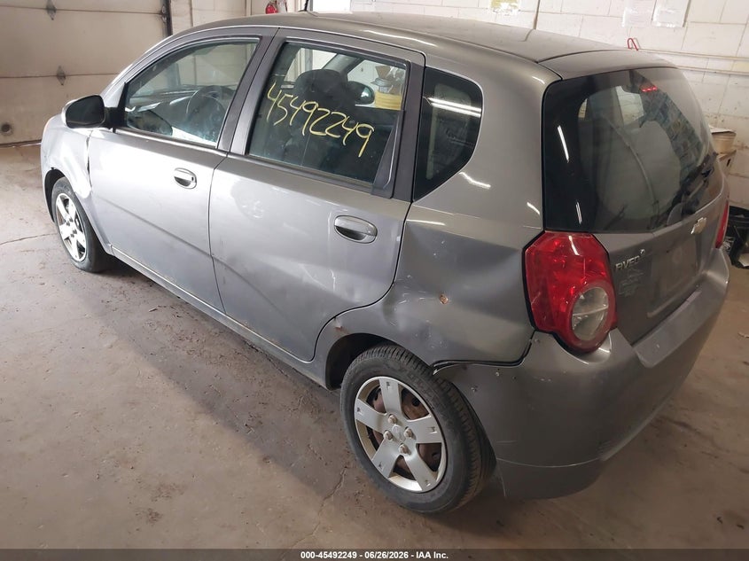 2011 Chevrolet Aveo VIN KL1TD6DE3BB182785 IAAI salvage auction — NORMAL WEAR, Clear (Minnesota), sold $350 on 2026-07-15 (photo 3)