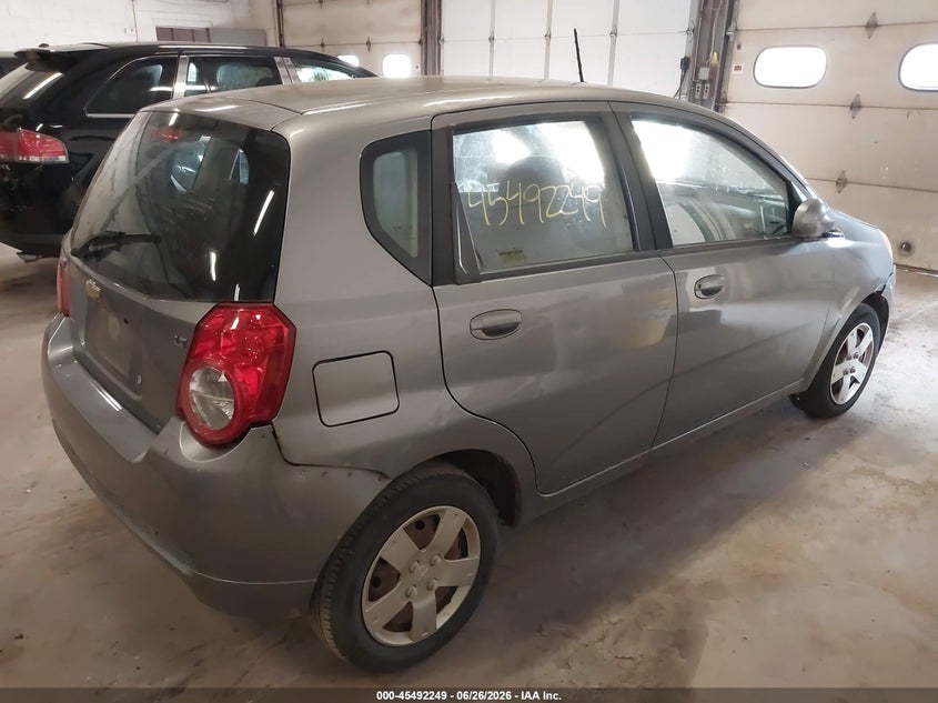 2011 Chevrolet Aveo VIN KL1TD6DE3BB182785 IAAI salvage auction — NORMAL WEAR, Clear (Minnesota), sold $350 on 2026-07-15 (photo 4)