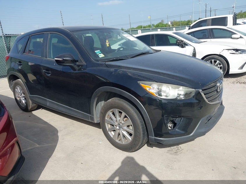 2016 Mazda Cx-5 VIN JM3KE2BY4G0911264 IAAI salvage auction — NORMAL WEAR, Original (Texas), sold $2,000 on 2026-07-06 (photo 1)