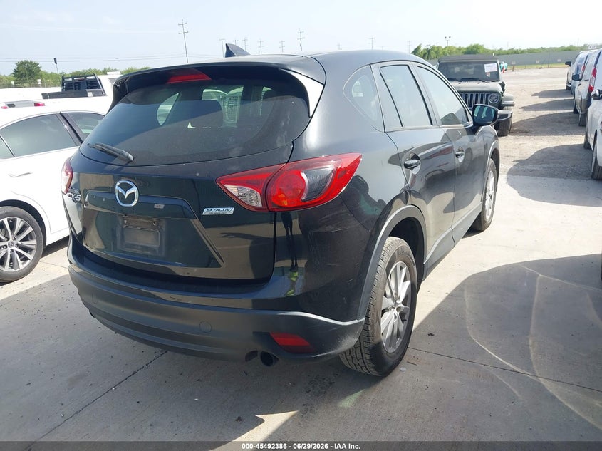 2016 Mazda Cx-5 VIN JM3KE2BY4G0911264 IAAI salvage auction — NORMAL WEAR, Original (Texas), sold $2,000 on 2026-07-06 (photo 4)