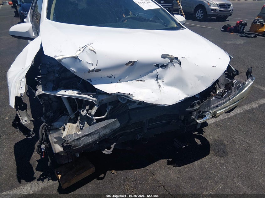 2015 Toyota Corolla VIN 5YFBURHE6FP218329 IAAI salvage auction — FRONT END, Salvage (Nevada), sold $900 on 2026-07-31 (photo 6)