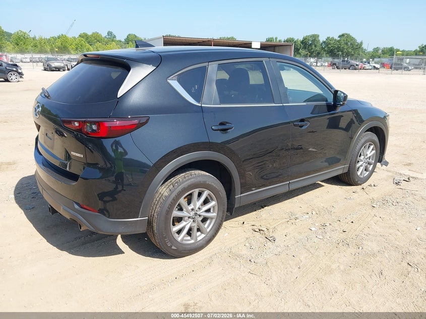 2023 Mazda Cx-5 VIN JM3KFBCM7P0281457 IAAI salvage auction — NORMAL WEAR, Clear (Wisconsin), sold $5,500 on 2026-07-10 (photo 4)